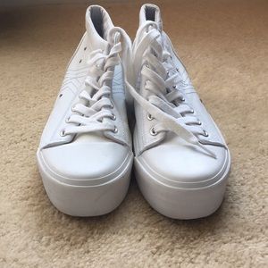 Size 8.5 white Keds hightop sneakers.